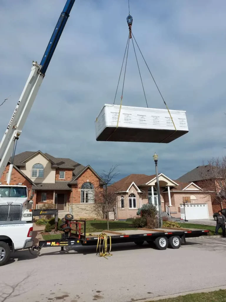 Crane Delivers A Swimlife Swim Spa Into Backyard