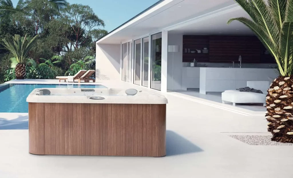6-Person Hot Tub For Ultimate Relaxation In Prince George, Ca - Eden Spas Jacuzzi Blog Jacuzzi J-235 With Lounger Seat Installed Next To Pool